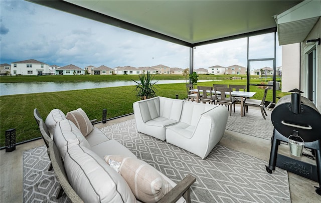 view of patio featuring a water view and an outdoor living space