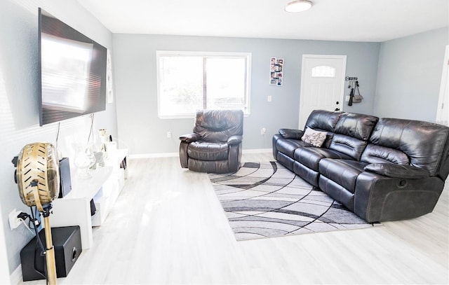 living room with light hardwood / wood-style floors