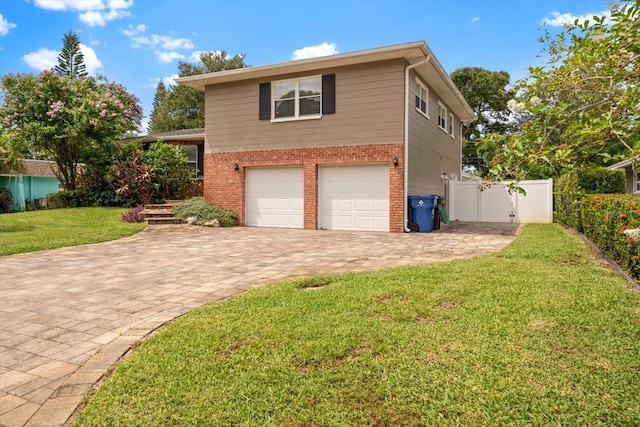 8212 Forest Cir, Seminole, FL 33776 - view of property exterior featuring brick siding, a garage, and driveway