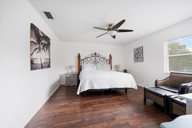 8212 Forest Cir, Seminole, FL 33776 - bedroom with wood finished floors, a ceiling fan, and baseboards