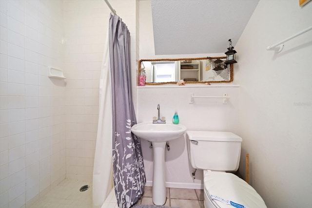8212 Forest Cir, Seminole, FL 33776 - bathroom with toilet, a shower stall, and tile patterned floors