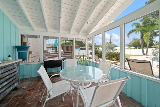 8212 Forest Cir, Seminole, FL 33776 - sunroom / solarium featuring outdoor dining area