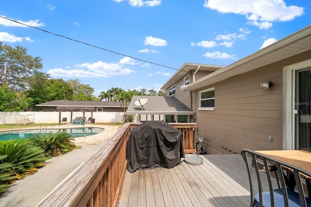 8212 Forest Cir, Seminole, FL 33776 - deck with a fenced backyard and grilling area