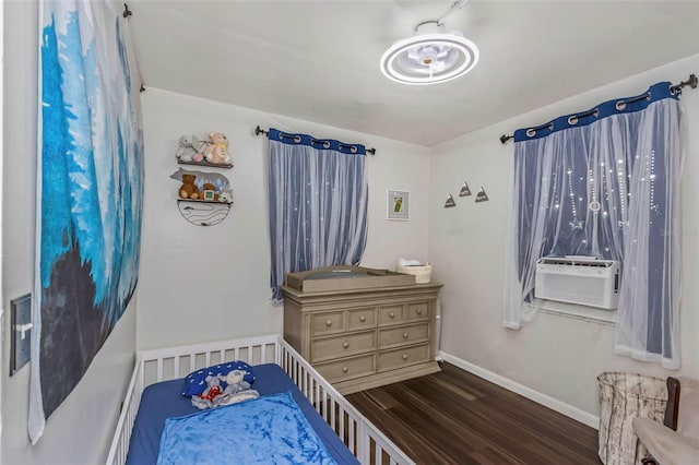 7331/2 New Jersey St, Clearwater, FL 33756 - bedroom featuring baseboards, wood finished floors, and cooling unit