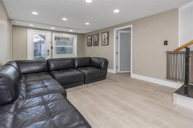 7331/2 New Jersey St, Clearwater, FL 33756 - living room featuring recessed lighting, light wood-style flooring, and baseboards
