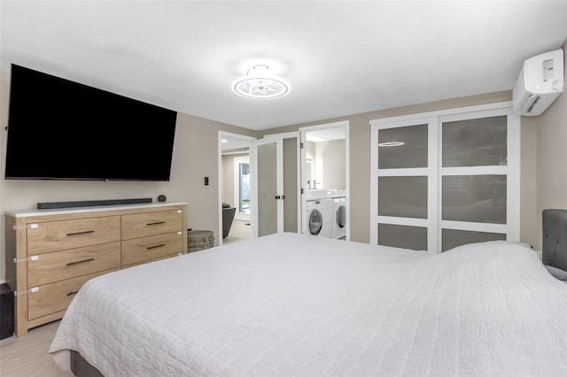 7331/2 New Jersey St, Clearwater, FL 33756 - bedroom featuring separate washer and dryer and a wall unit AC