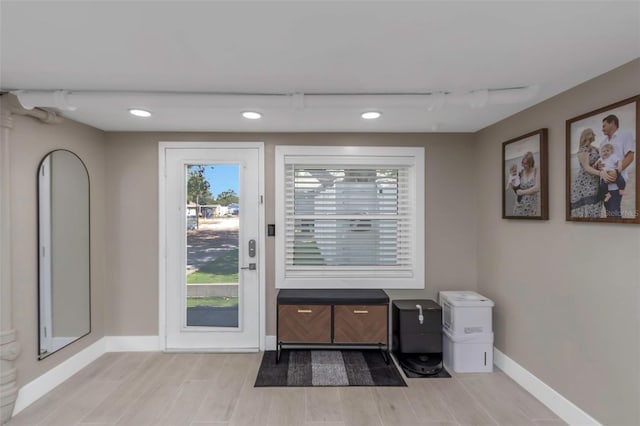 7331/2 New Jersey St, Clearwater, FL 33756 - doorway featuring recessed lighting, baseboards, and wood finished floors