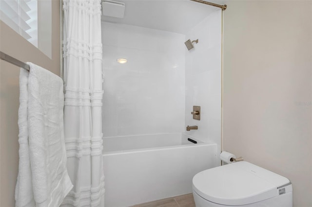7331/2 New Jersey St, Clearwater, FL 33756 - bathroom featuring shower / tub combo with curtain and toilet