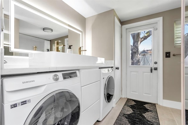7331/2 New Jersey St, Clearwater, FL 33756 - laundry area featuring laundry area, light tile patterned floors, and washer and dryer