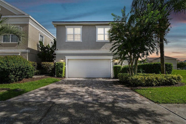 view of front of home featuring a garage