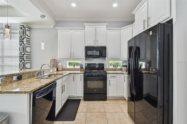 kitchen with white cabinets, pendant lighting, kitchen peninsula, and black appliances