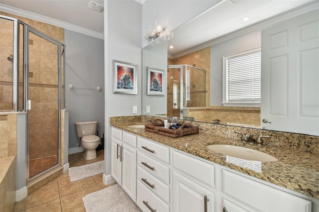 bathroom featuring tile patterned flooring, an enclosed shower, vanity, and toilet