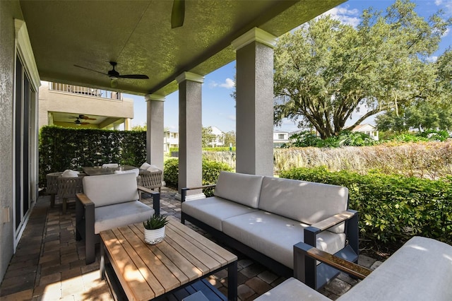 view of patio with an outdoor hangout area and ceiling fan