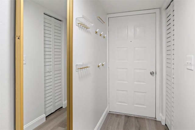 10800 US Highway 19 N Unit 112, Pinellas Park, FL 33782 - corridor with wood finished floors and baseboards