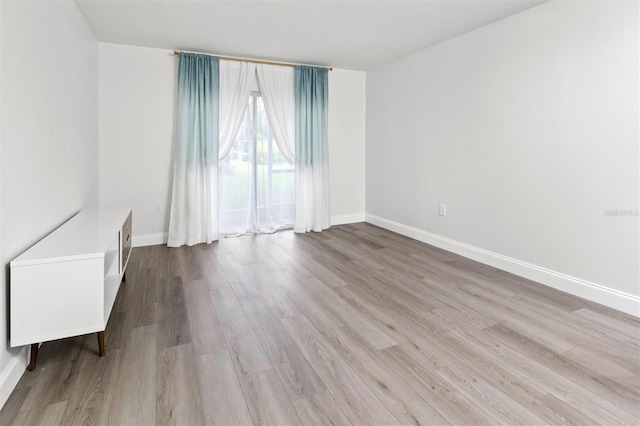 10800 US Highway 19 N Unit 112, Pinellas Park, FL 33782 - unfurnished room featuring wood finished floors and baseboards