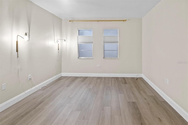10800 US Highway 19 N Unit 112, Pinellas Park, FL 33782 - unfurnished room with wood finished floors and baseboards