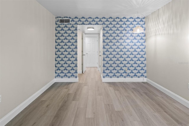 10800 US Highway 19 N Unit 112, Pinellas Park, FL 33782 - unfurnished room featuring wood finished floors and baseboards