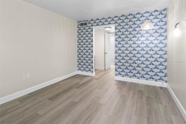 10800 US Highway 19 N Unit 112, Pinellas Park, FL 33782 - empty room with wood finished floors and baseboards