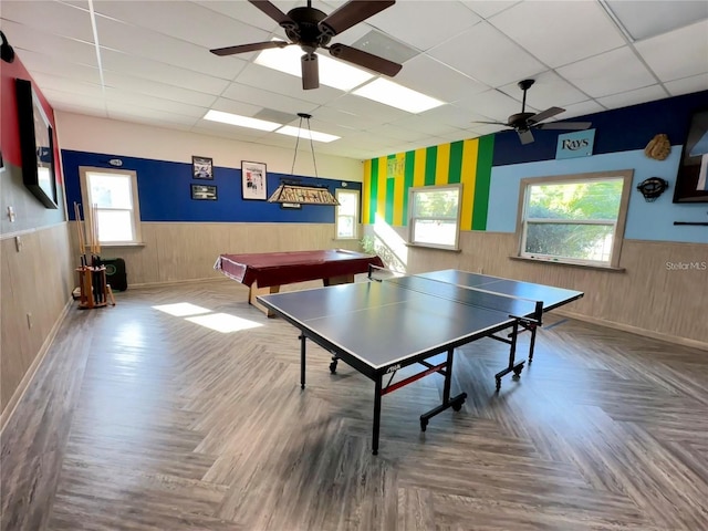 10800 US Highway 19 N Unit 112, Pinellas Park, FL 33782 - recreation room with a wainscoted wall, a drop ceiling, a ceiling fan, plenty of natural light, and billiards