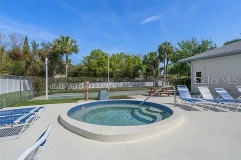 10800 US Highway 19 N Unit 112, Pinellas Park, FL 33782 - view of pool with a patio area