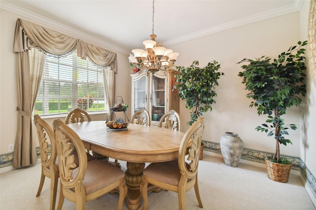 carpeted dining room featuring crown molding and a chandelier