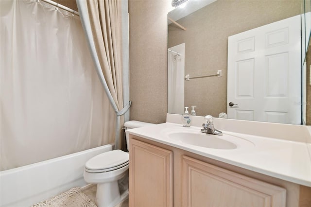 full bathroom with toilet, shower / tub combo, and vanity