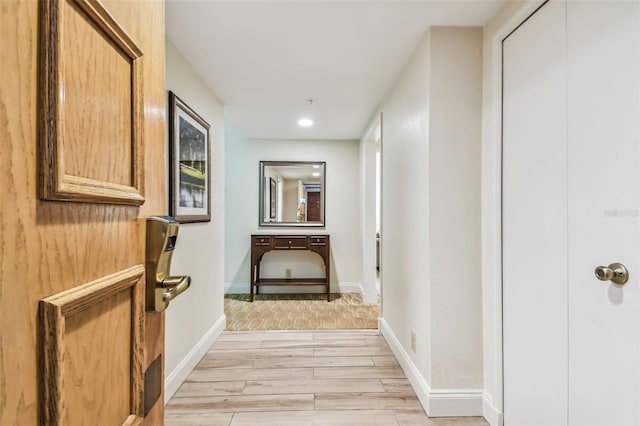 corridor featuring light hardwood / wood-style flooring