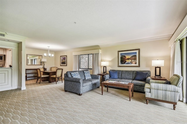 living room featuring ornamental molding, a textured ceiling, an inviting chandelier, and light colored carpet