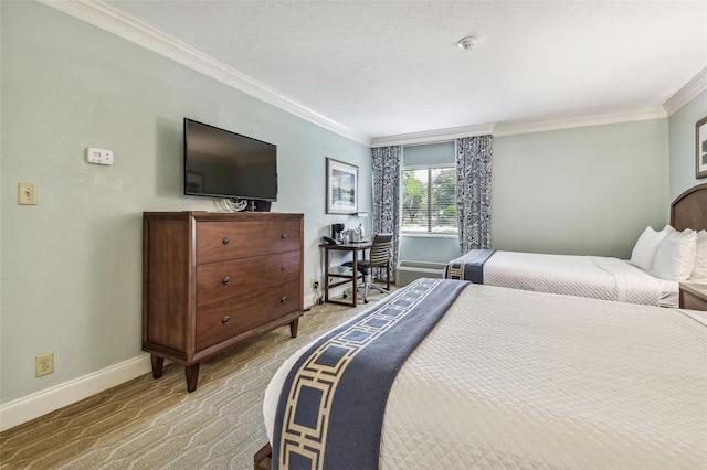 bedroom featuring a textured ceiling and ornamental molding