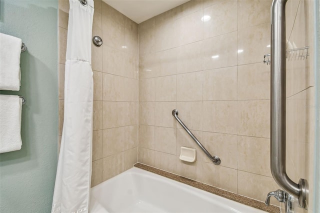 bathroom with shower / tub combo