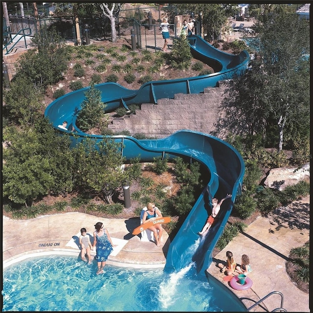 view of pool featuring a water slide