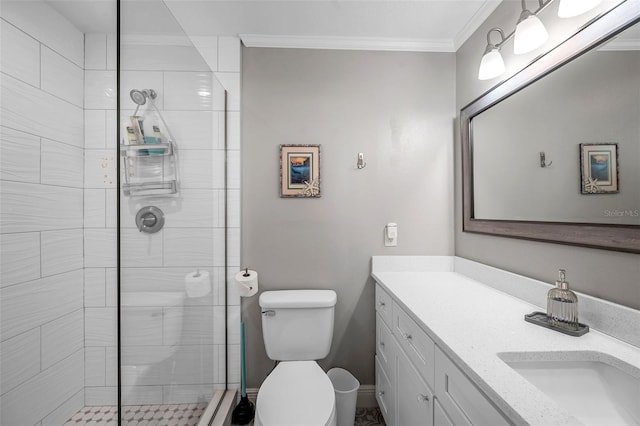 bathroom with a shower with shower door, crown molding, vanity, and toilet