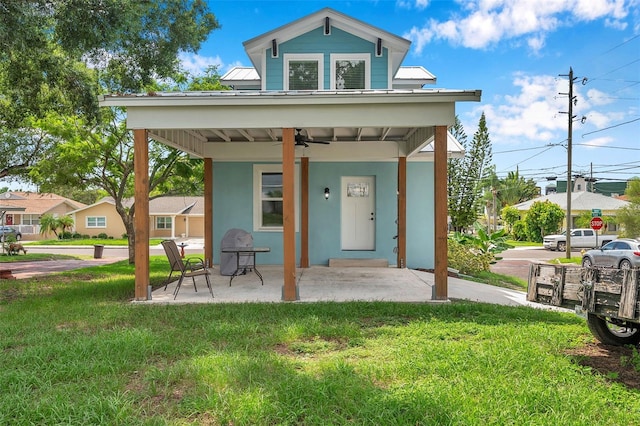 exterior space with a yard and covered porch