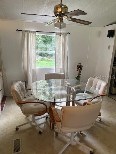 dining area featuring ceiling fan