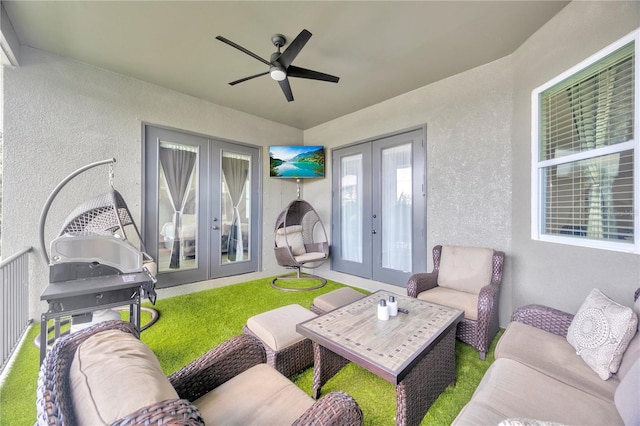 view of patio / terrace featuring ceiling fan, an outdoor hangout area, and french doors