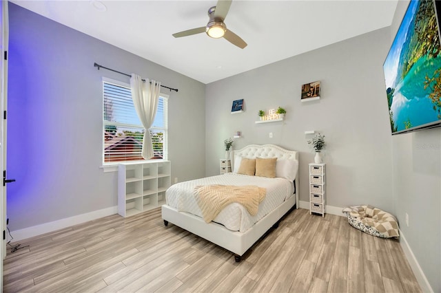 bedroom featuring ceiling fan and light wood-type flooring