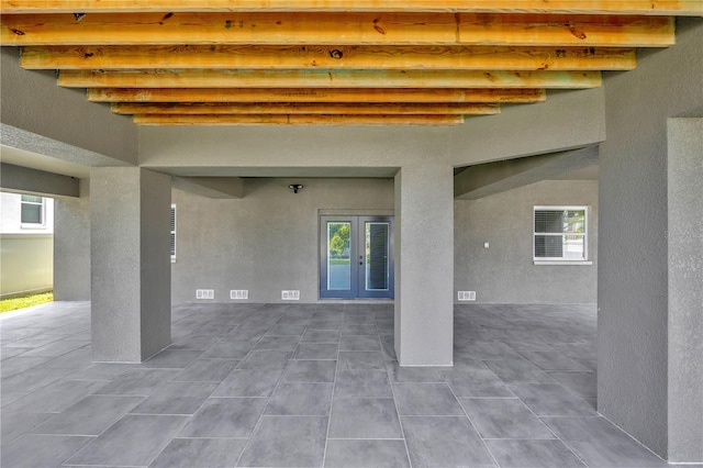 view of patio featuring french doors