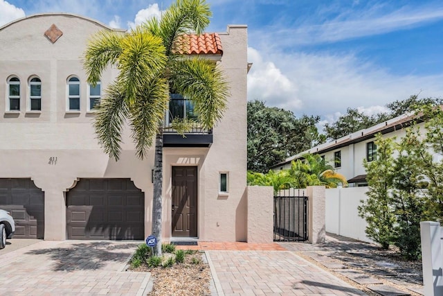 view of front of property with a garage