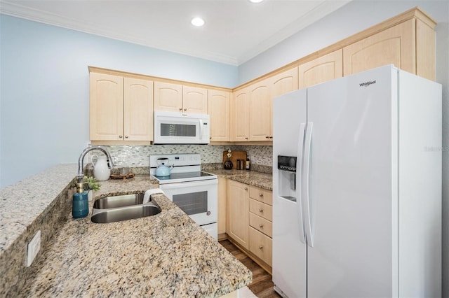 kitchen with crown molding, white appliances, light stone counters, sink, and light brown cabinets