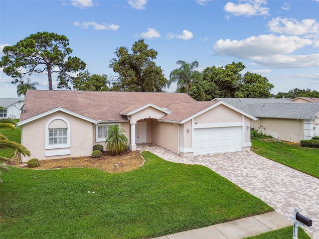 ranch-style house with a front lawn and a garage