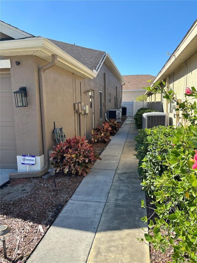 view of home's exterior featuring central AC