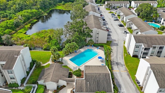 drone / aerial view with a water view