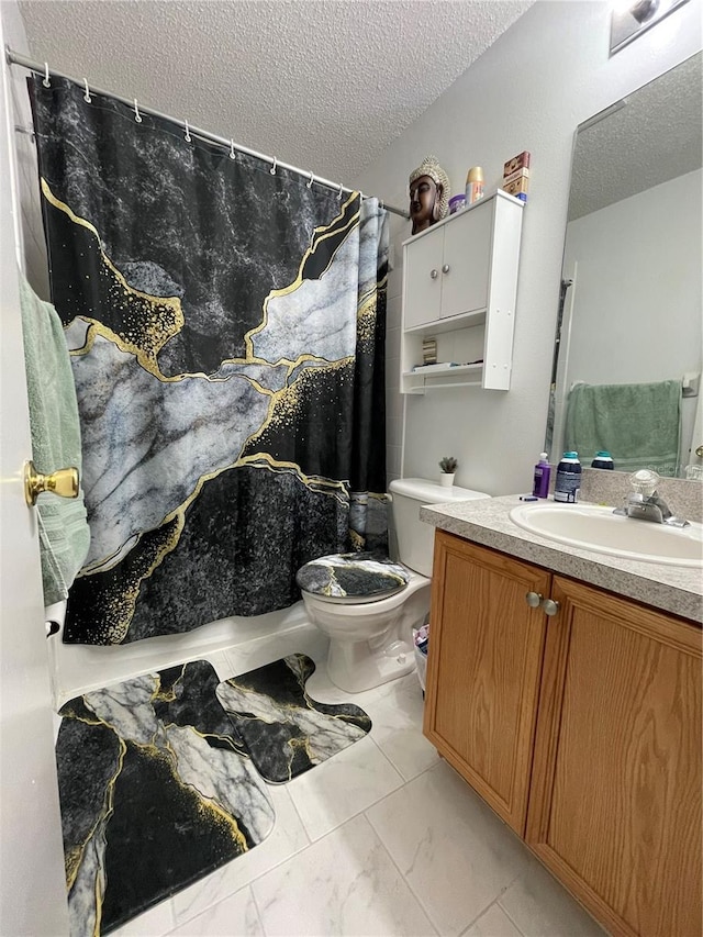 bathroom with vanity, toilet, a textured ceiling, and a shower with shower curtain