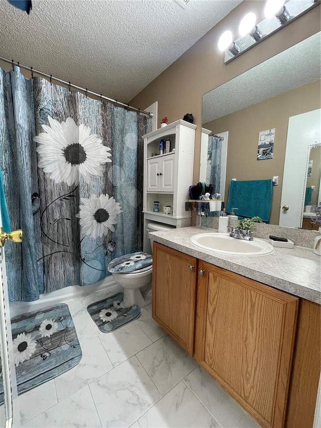 full bathroom with a textured ceiling, vanity, toilet, and shower / bath combo with shower curtain