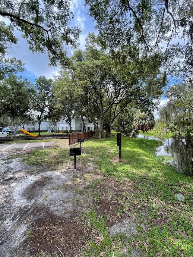 view of yard featuring a water view