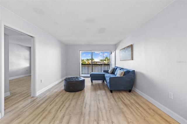 sitting room with light hardwood / wood-style floors