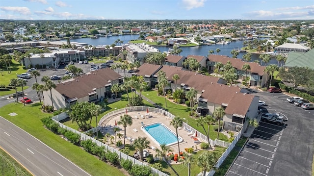 birds eye view of property featuring a water view