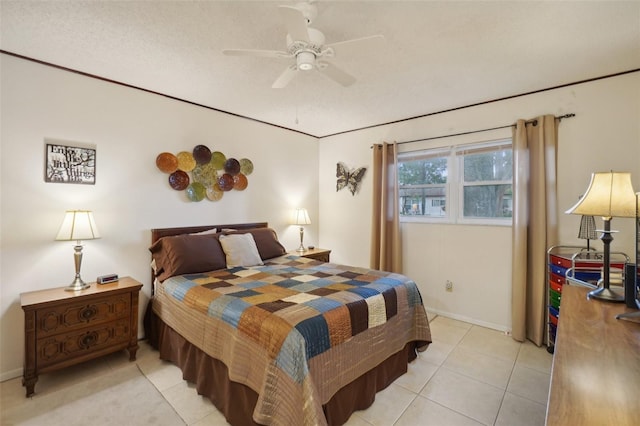 tiled bedroom featuring ceiling fan