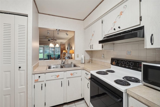 kitchen featuring white cabinets, light tile patterned floors, sink, tasteful backsplash, and white range with electric cooktop