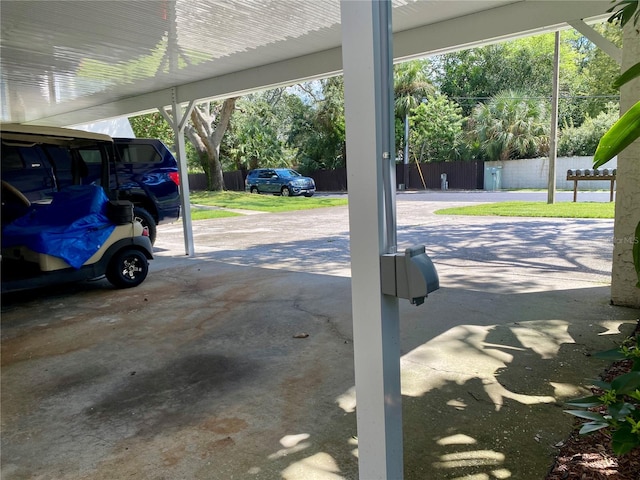 exterior space featuring a carport